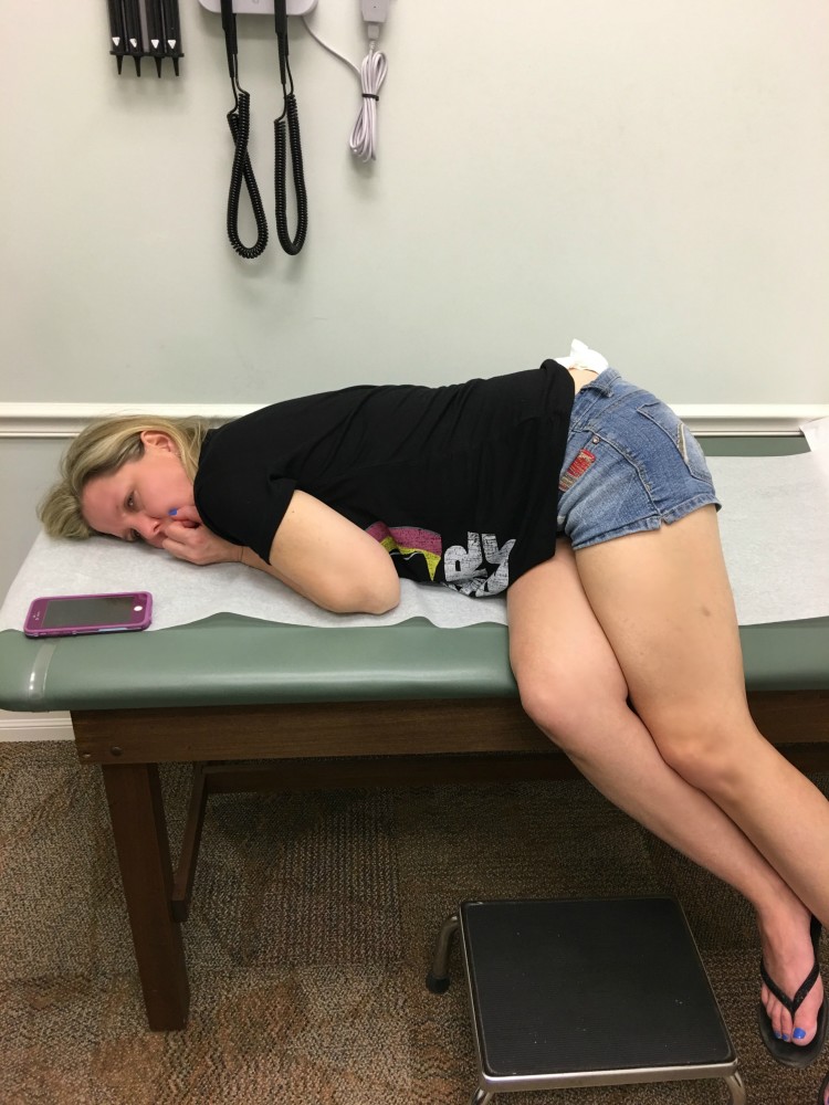 Laying on clinic table