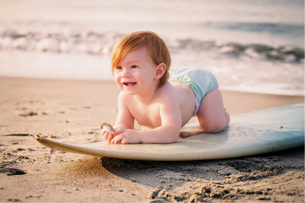 baby on surfboard