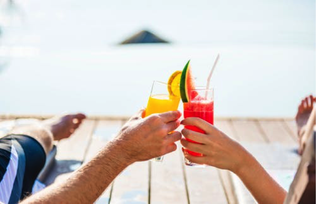 having drinks on the beach